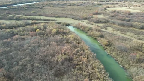 River Beside Patchwork Farmland in Inner Mongolia, China Stock Footage 344037014