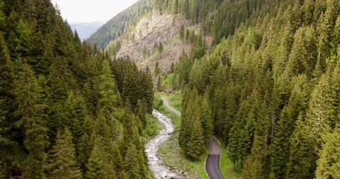 River between forest in the Alps, Aerial view of stream of water. Nature 4K Video stock 146584081