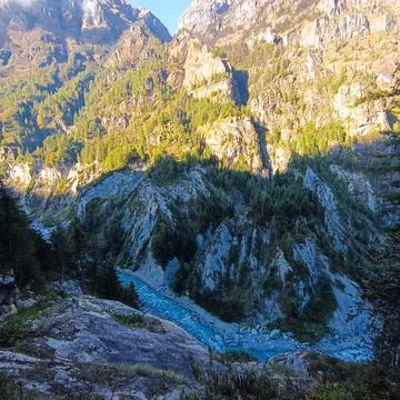 A river between steep banks. Stock Photos
