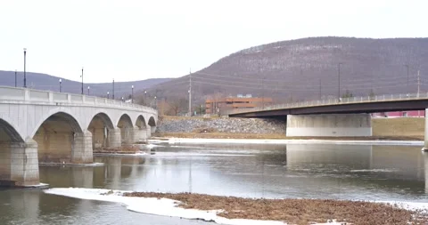 River between two bridges in Winter. Corning, New York Stock Footage 229430000