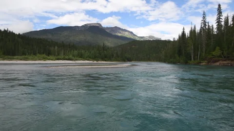 River boating down Clearwater River in mountains, Wells Gray Park, 4k Stock Footage 247093193