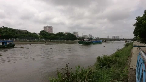 River with boats, clouds time lapse in Saigon Vietnam Stock Footage 155872792