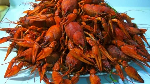 River boiled crayfish a good snack to beer. Waiter puts on the table a plate of Stock Footage 120003031