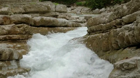 The river breaks through the stones Stock Footage 69837814