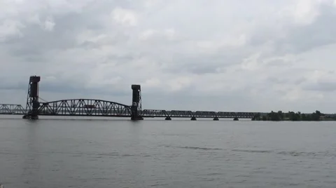 River With Bridge and Passing Train and Boats Video stock 40860435