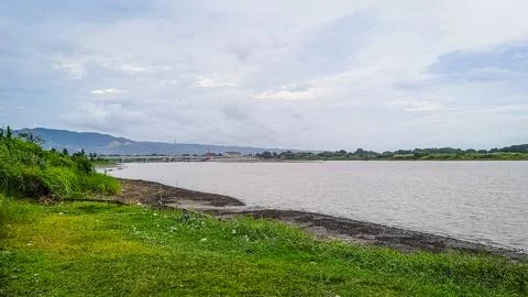 A river with a bridge in the background Foto stock