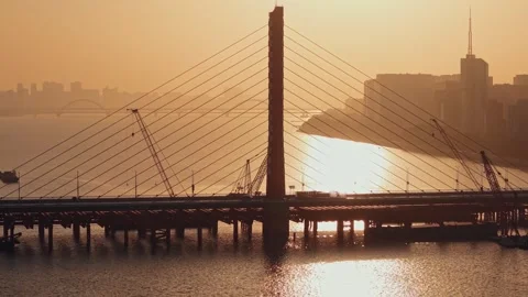 River bridge construction at sunset in Hangzhou, China from high angle view Stock-Footage 325079907