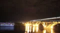River bridge at night, cars drive water flows, clouds time-lapse HD Footage