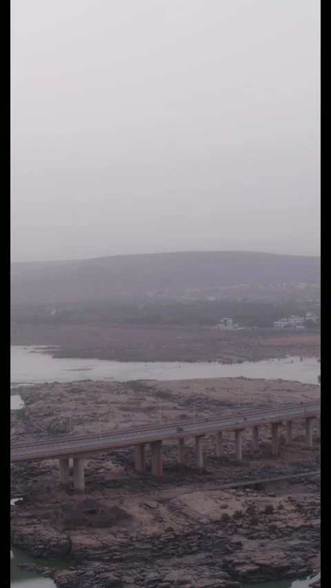 River Bridge Spanning River Valley Aerial - Vertical (9:16) Stock Footage 322550302