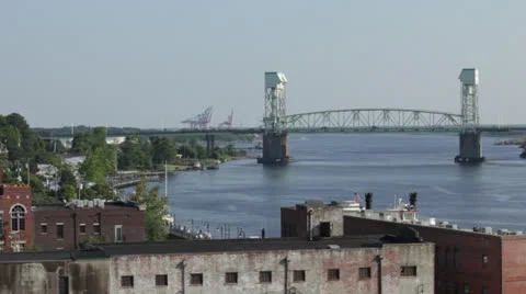 River bridge with traffic and downtown waterfront Stock Footage 24638053