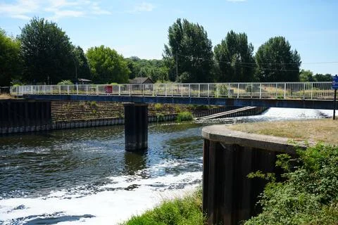 River, Bridge, Weir, Trees, Blue Sky, Nottinghamshire, England Stock Photos
