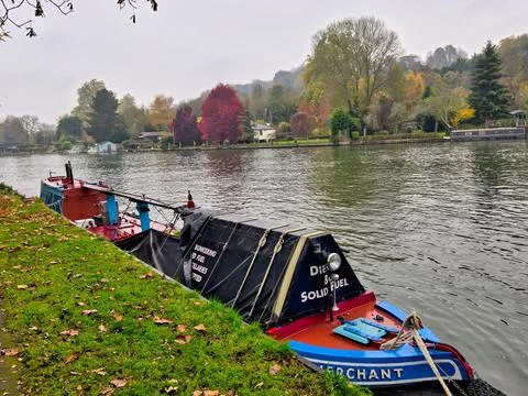 River Bunker barge proving bunkering and oil delivery to house boats on the.. Stock Photos
