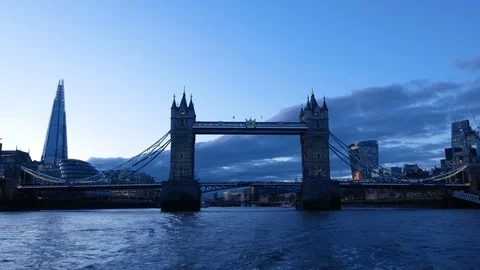 River bus boat passes Tower Bridge in river Thames Vídeos de archivo 107805073