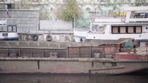 River cargo barge sails in parallel, close-up. fall Stock Footage 141737955