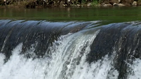 River cascade that flows fast and clear Stock Footage 292842545