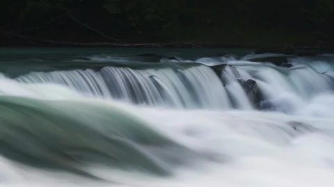 River cascading down rocks 8K time lapse Stock Footage 111129902