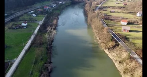 The river in central Bosnia flows through the village Stock Footage 274388938