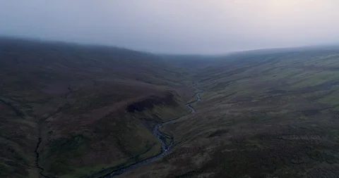 River in a cloud covered valley Video stock 124666986