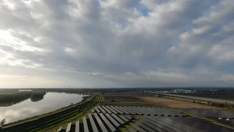 River, clouds and a solar field Stock Footage