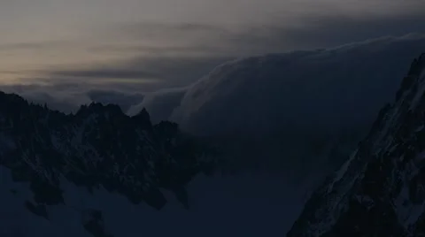 River of Clouds / Sunrise Timelapse over Mountains in Alps Stock Footage 61819720