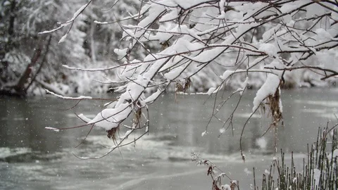River Coast Covered with Snow Stock Footage 99926936