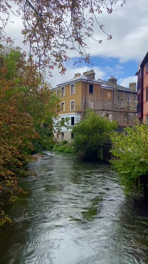 The River Colne flows through Staines-upon-Thames Stock Footage 290032668