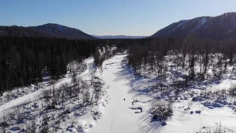 The river is completely covered with snow. Stock Footage 170871914