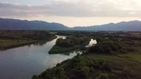 River confluence with mountains during sunrise 스톡 동영상 130225151