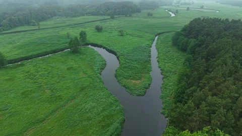 River Confluence – Parallax Right Tilt Down Wide Aerial Flight Over Watershed Stock Footage 336468825