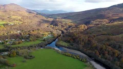 River confluence in Scottish Highland valley 4K aerial drone footage UK Stock Footage 123970931