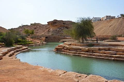 River course through rocks in a park in Riyadh, Saudi Arabia Stock Photos