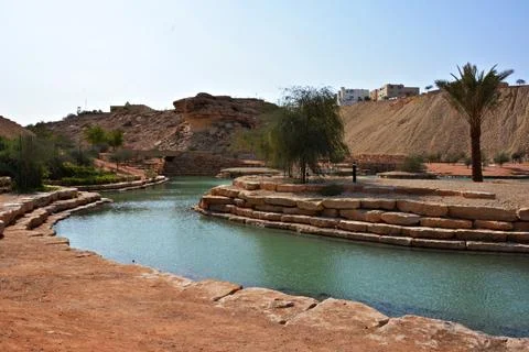 River course through rocks in a park in Riyadh, Saudi Arabia Stock Photos