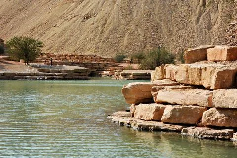 River course through rocks in a park in Riyadh, Saudi Arabia Stock Photos