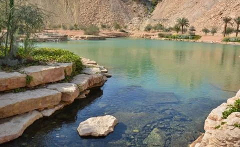 River course through rocks in a park in Riyadh, Saudi Arabia Stock Photos