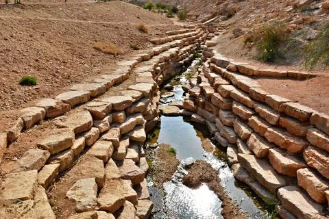 River course through rocks in a park in Riyadh, Saudi Arabia Stock Photos