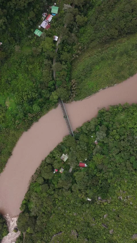 River Crossing and Jungle Settlement Near Machu Picchu from Above Stock Footage 337713932