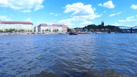 River Crossing: Boat Ride, Train on Bridge, Tram in Cityscape - Wideshot Stock Footage 244812293