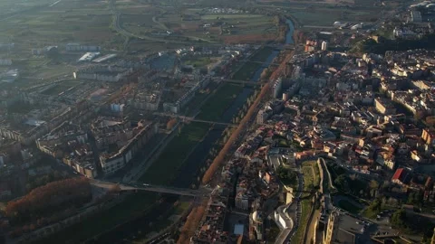 River crossing the city 4K drone footage Stock Footage 303659366