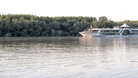 River cruiser passing by the Danube river. Stock Footage 163427253