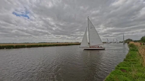 River Cruiser racing down the River Bure, Norfolk Broads Video stock 309832985
