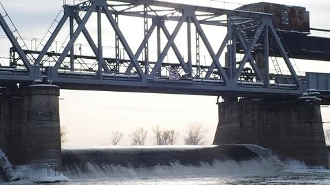 River, dam with winter scene in background. Stock Footage 82456921