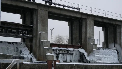 River, dam with winter scene in background. The turbulent water of the dam in th Stock Footage 84843789