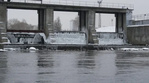 River, dam with winter scene in background. The turbulent water of the dam in th Stock Footage 84847222