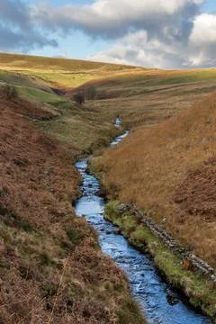 River Dane flowing down a valley Stock Photos
