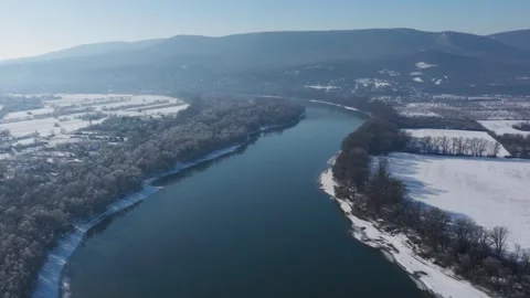 River Danube aerial view in winter. Dunabogdany, Hungary. 2026. Stock Footage 327080465