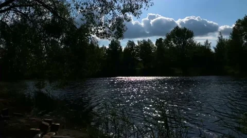River in a dark tone with clouds Stock Footage 155299033
