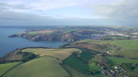 River Dart and Fields in autumn colors over Kingswear and Dartmouth from a drone Video stock 165136197