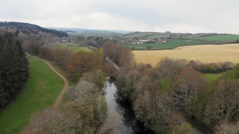 River Dart and Green Fields at Dartington Hall Gardens Drone Shot Video stock 206862580