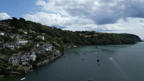 River Dart, Kingswear, S. Devon, England: DRONE VIEWS: Kingswear, Boats &amp; Houses Stock Footage 244935575