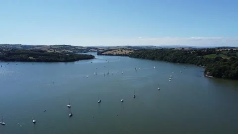 River Dart, South Devon, England: Drone View: Wayfarer training yachts sailing Stock Footage 201207400